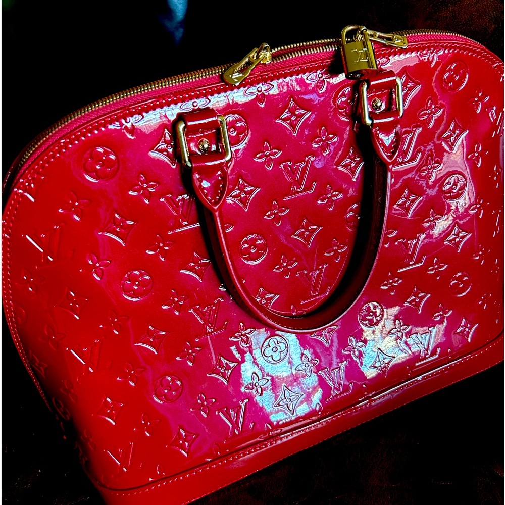 LV bag Red Patent FAUX. A little scuffed!